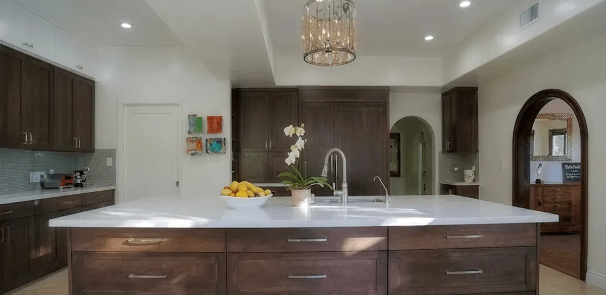 Cabinet refacing project with updated kitchen cabinets and island in Rockford, IL